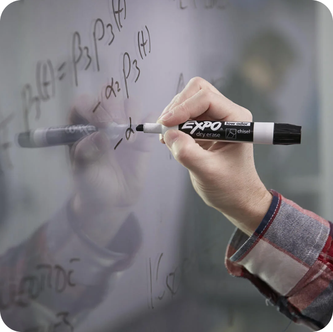 Person Writing Math Equations